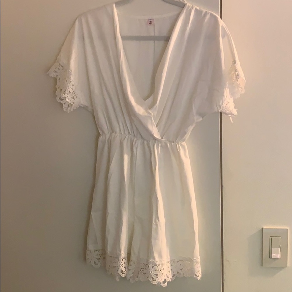 White romper with lace